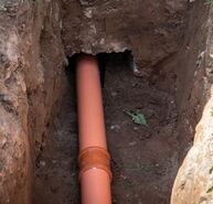 New orange sewer line in the ground.