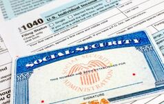 Blank social security card placed on top of the EZ1040 form